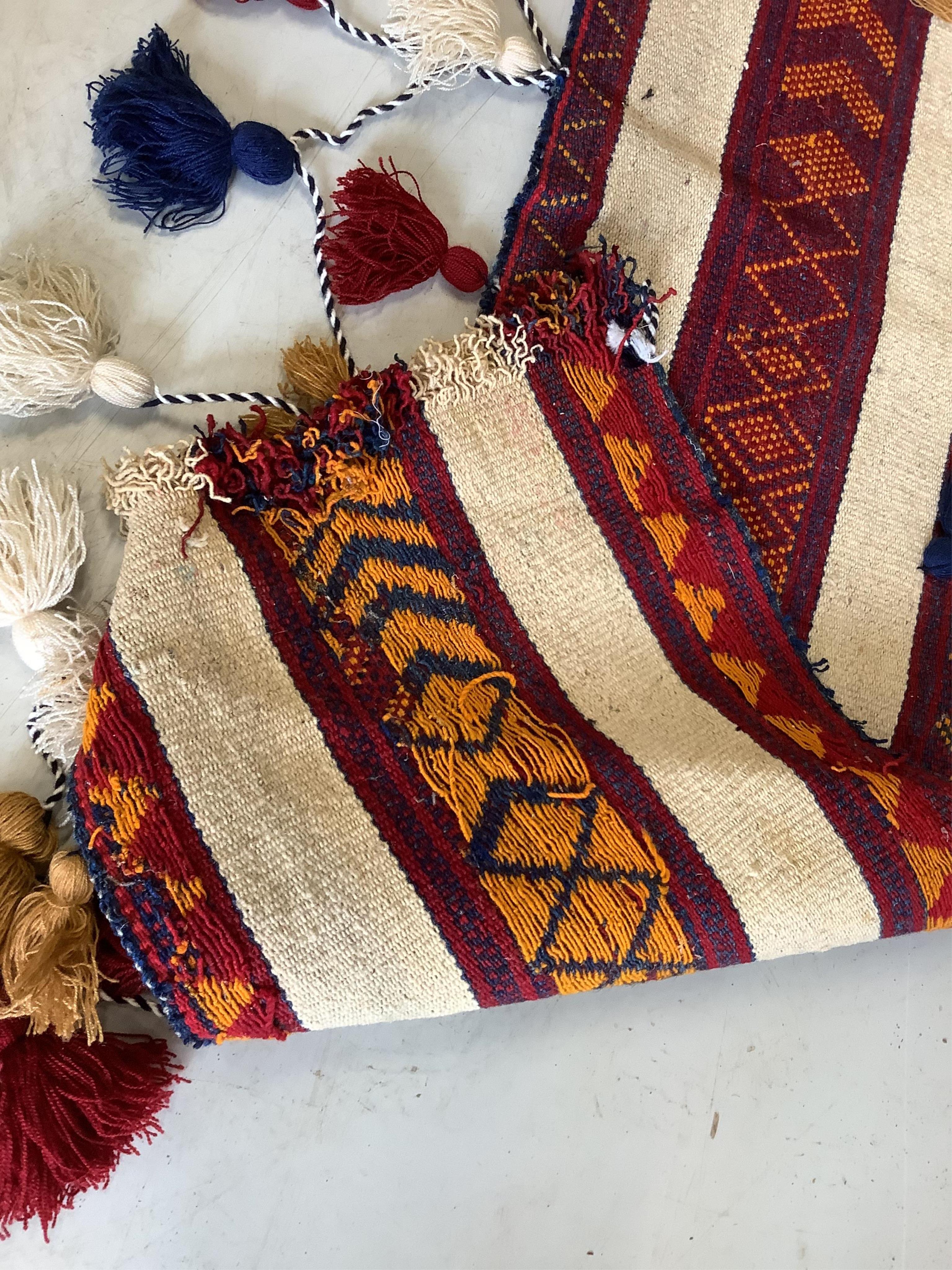 An Anatolian fringed wall hanging, 360 x 73cm. Condition - good